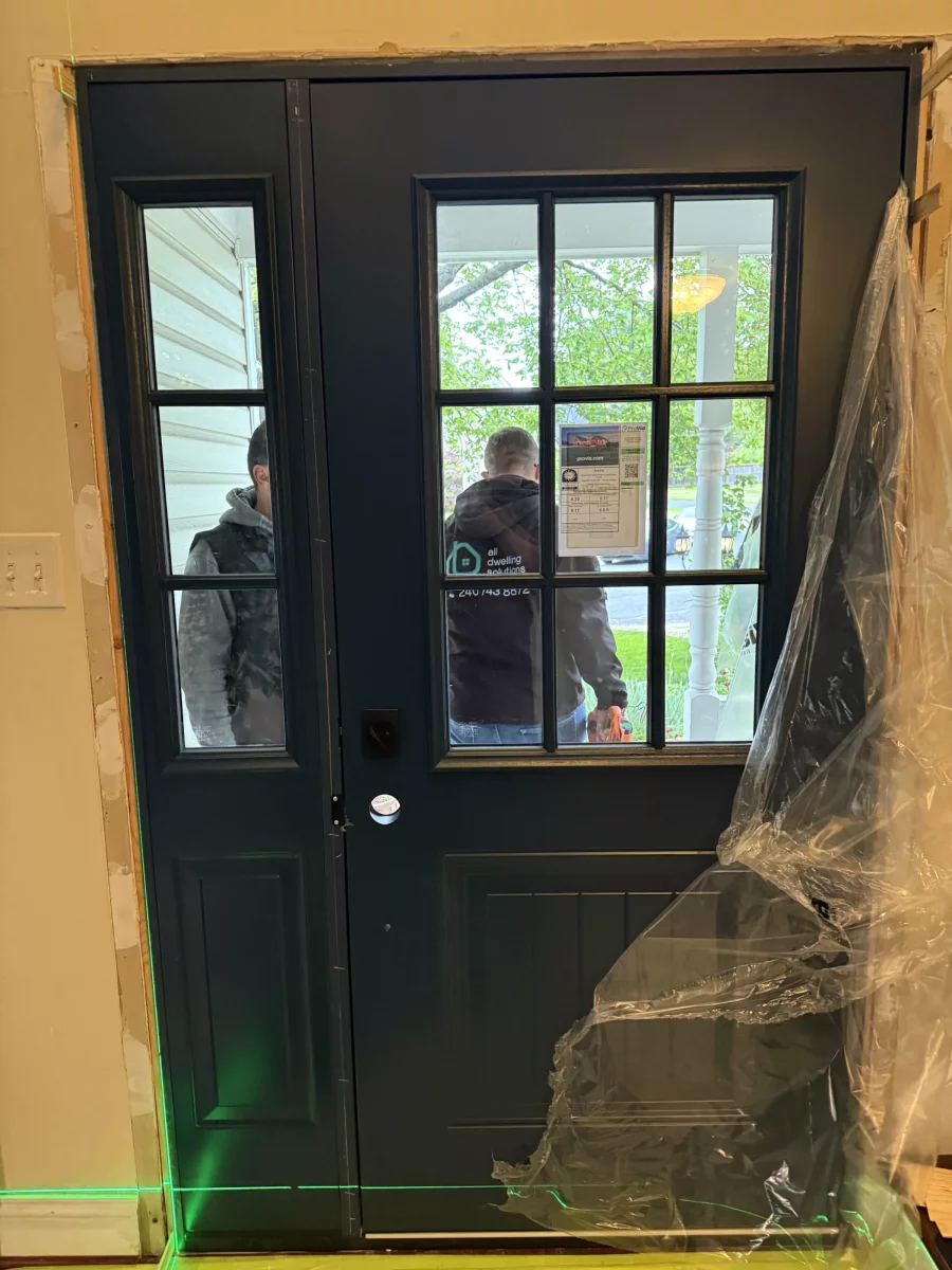 Entry door installation with laser