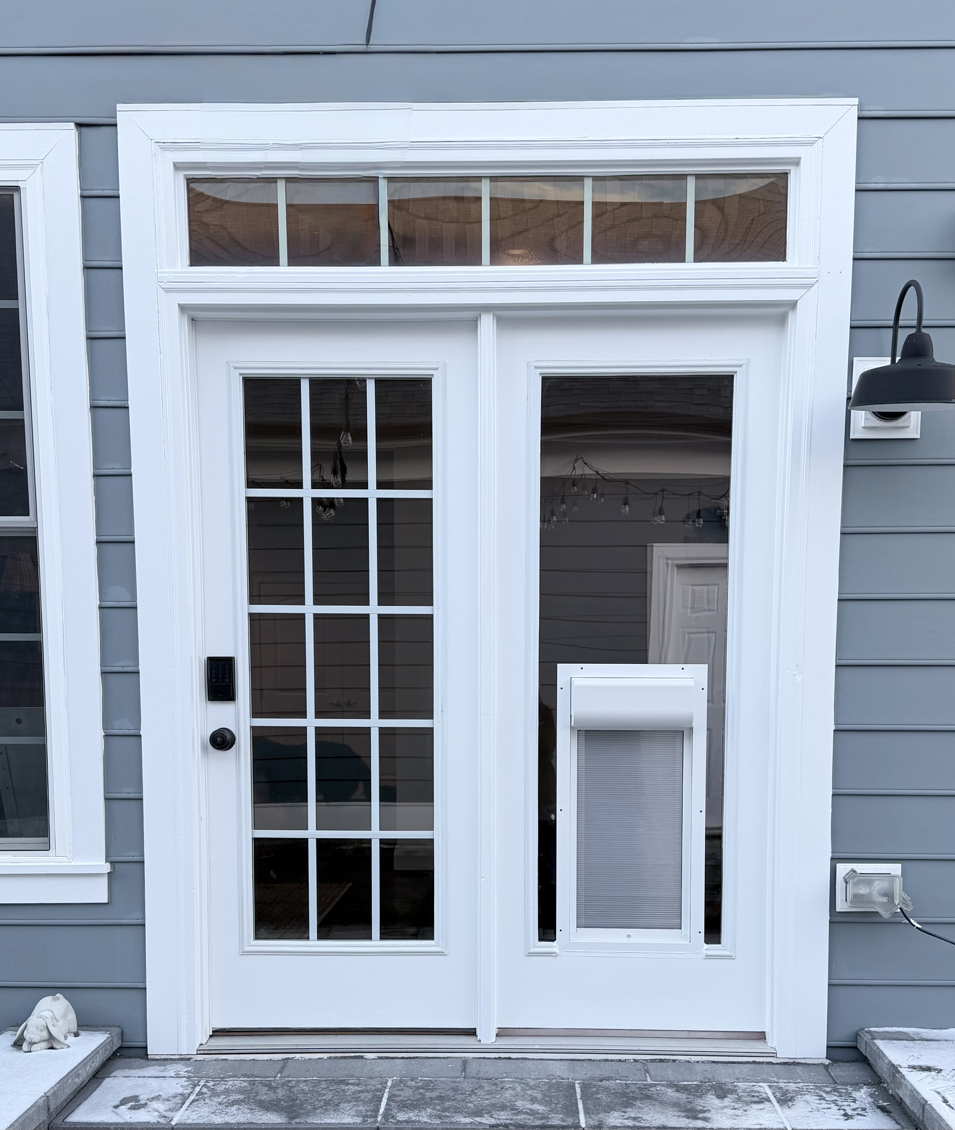 Modern pet door installed in a glass door, combining convenience, security, and clean design for everyday use.