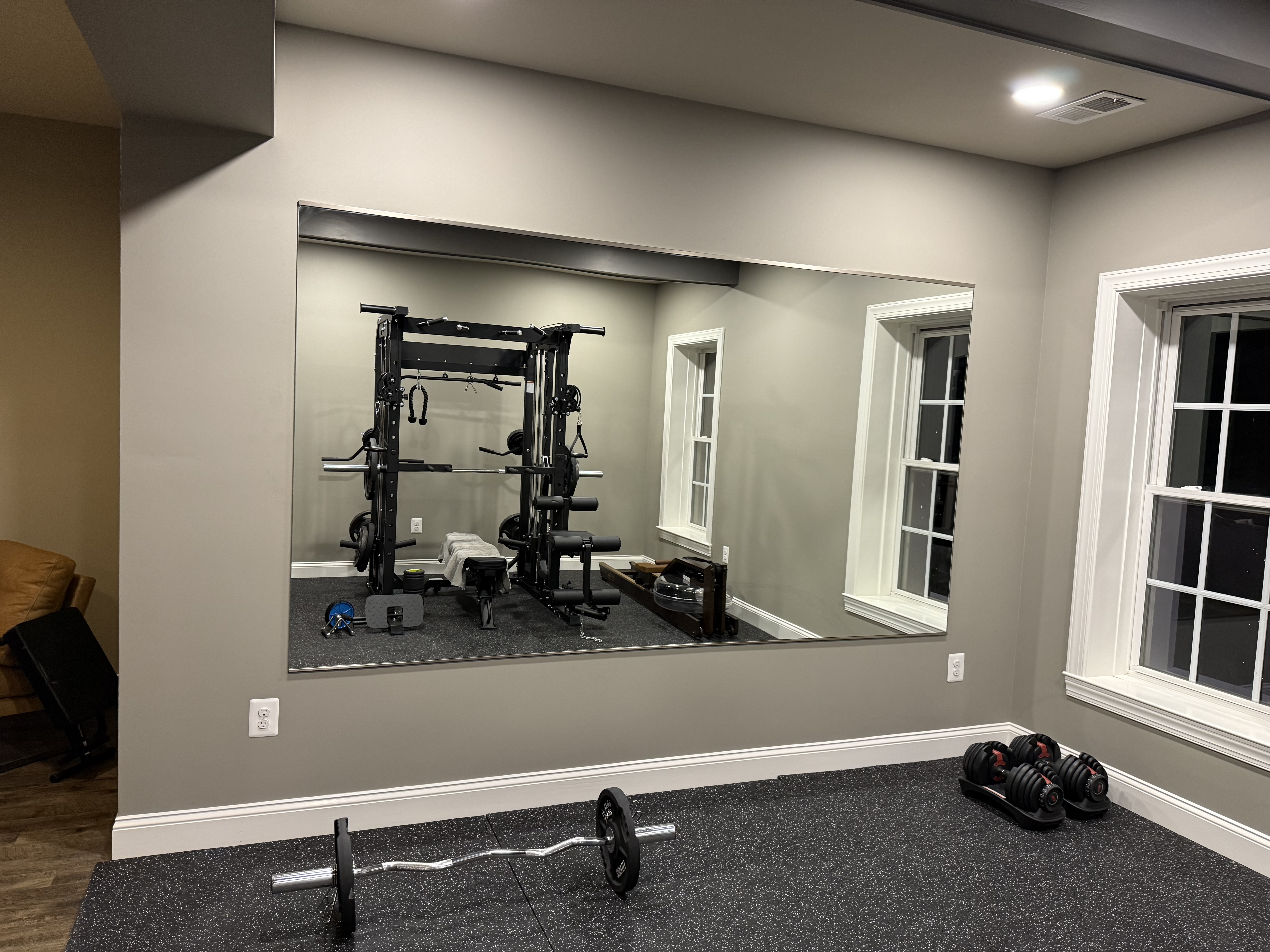 Completed home gym mirror installation providing modern look and enhanced space in Frederick MD.