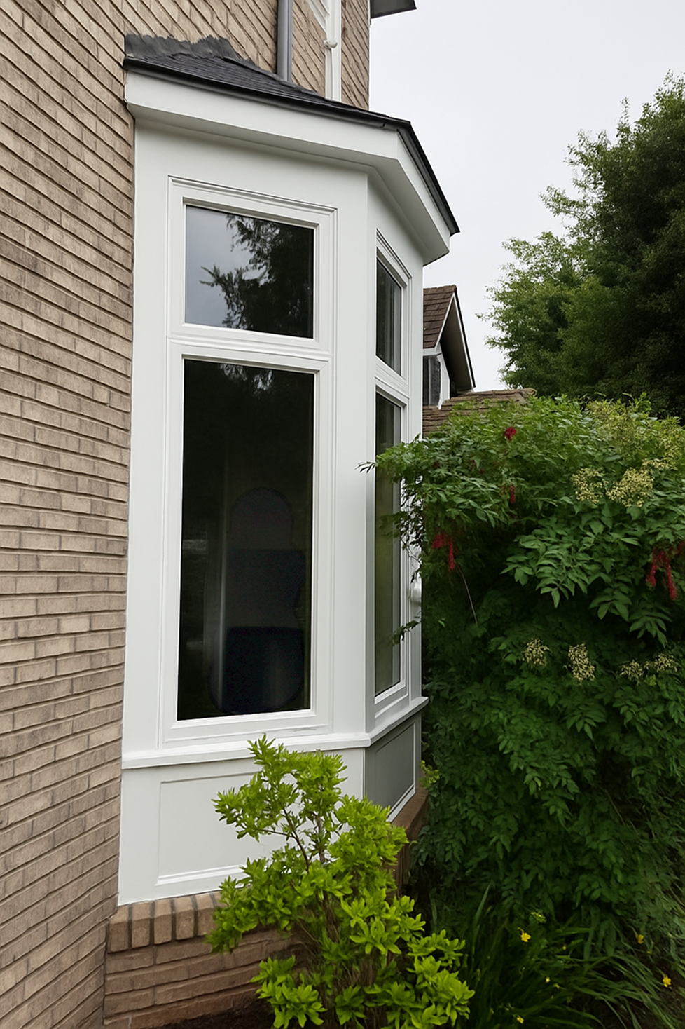 Full Exterior Trim Replacement Around Bay Window after 0 photo.