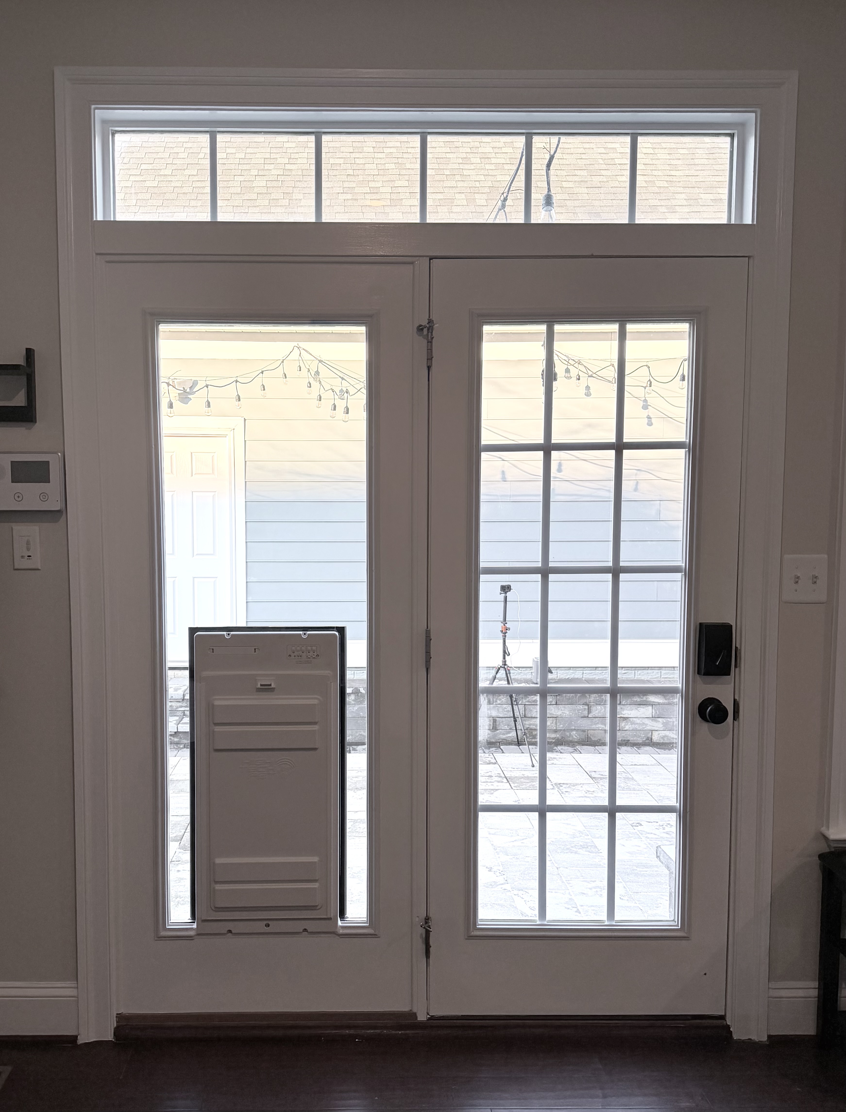 French Door Upgrade with Pet Door Installation after 0 photo.