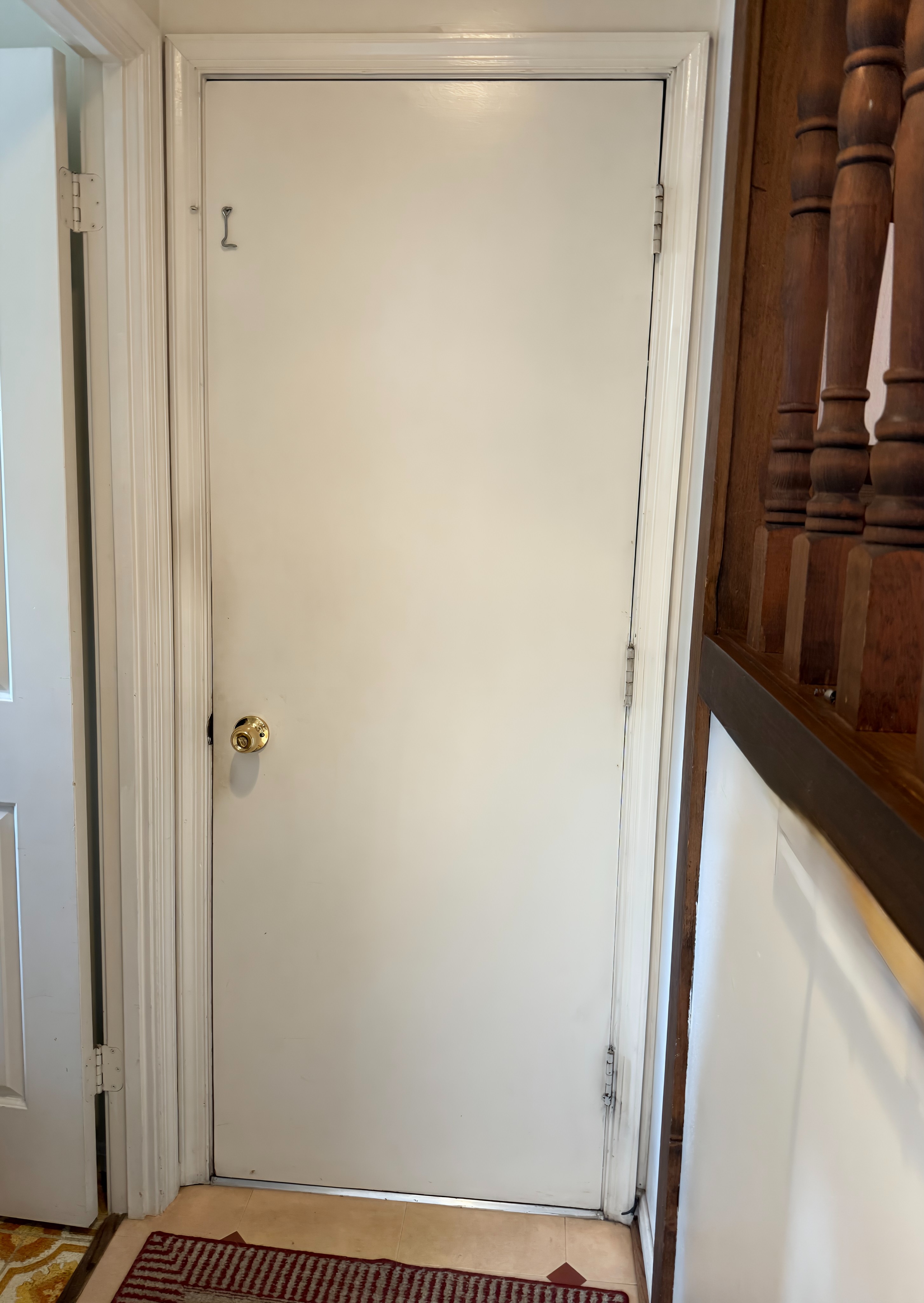 Interior view of old door before replacement with visible wear on edges.