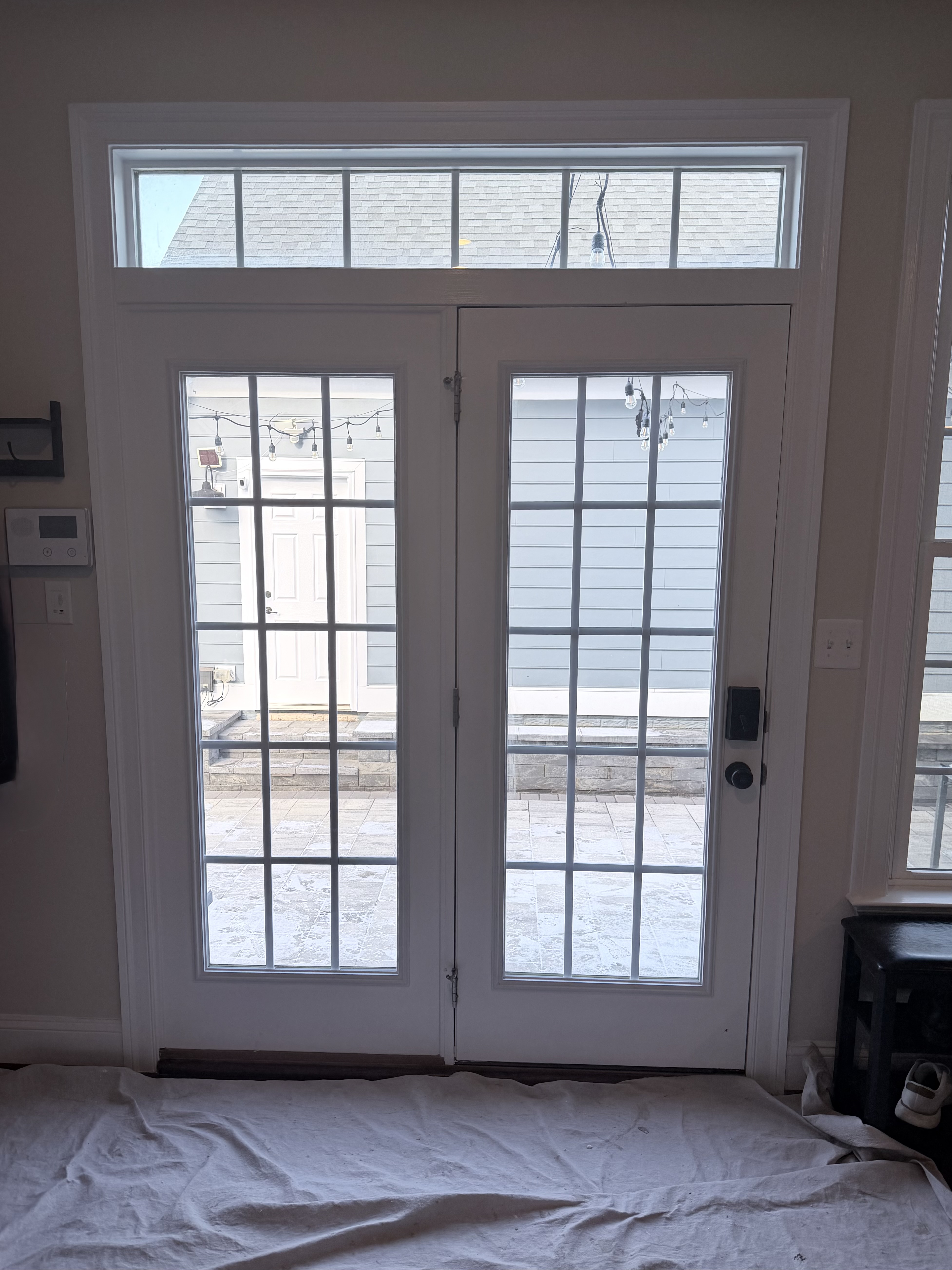 French Door Upgrade with Pet Door Installation before 0 photo.