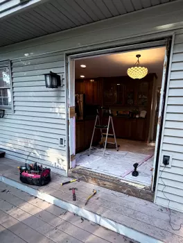 Patio Door Replacement and Wall Dog Door Installation project photo.