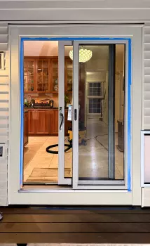 Patio Door Replacement and Wall Dog Door Installation project photo.