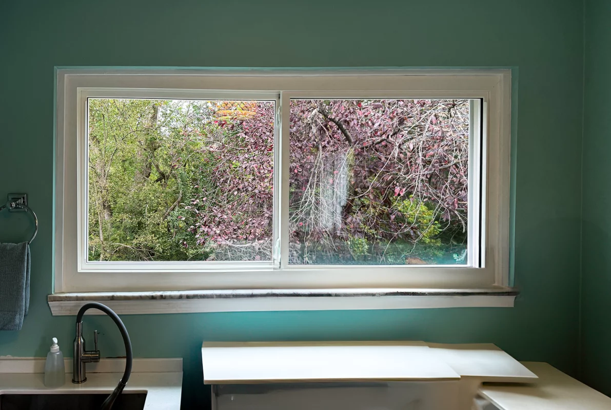 Slider Window and Storm Door Installation gallery photo.