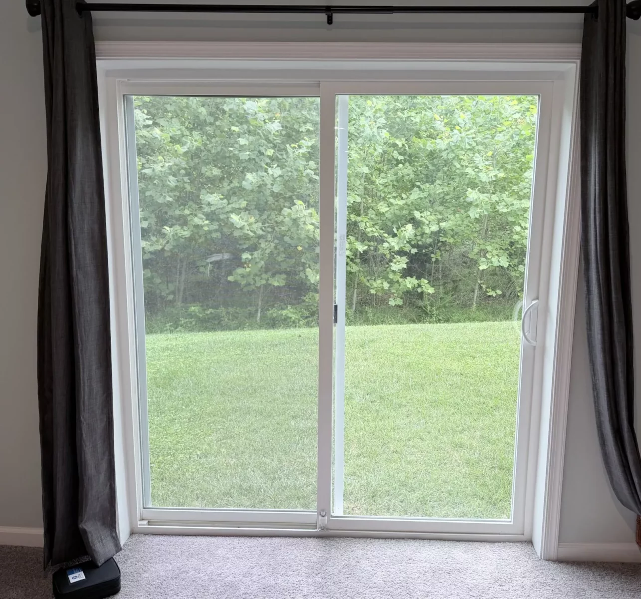 Interior view of sliding glass patio door before extra-large dog door installation