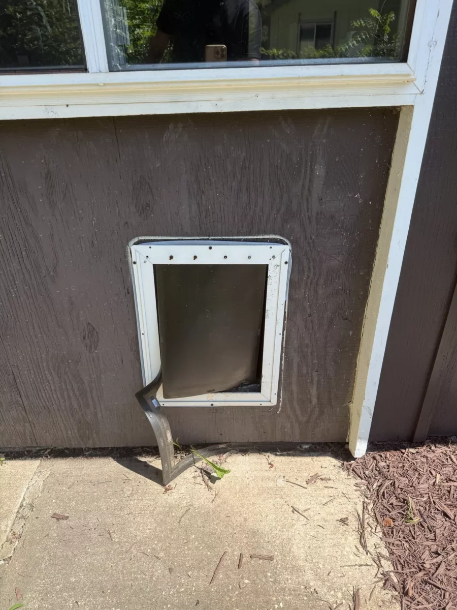 .	Exterior wall opening prepared for custom pet door installation
