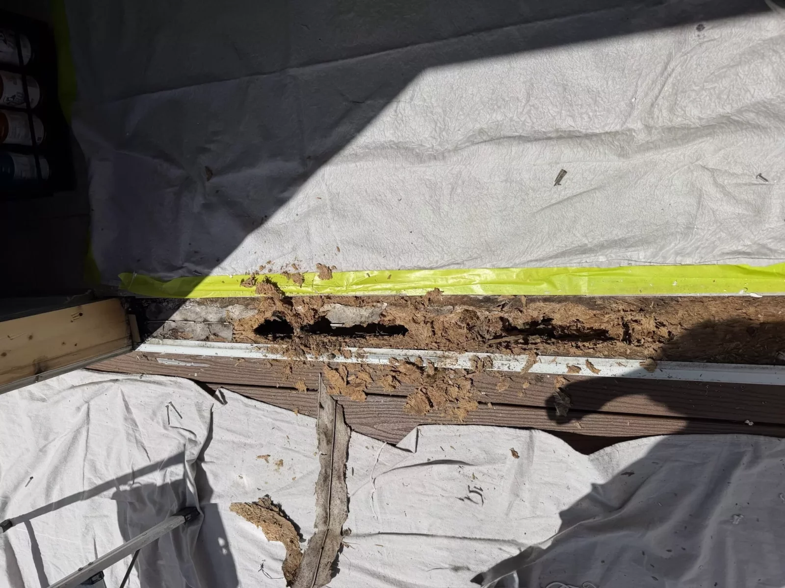 Rotted wood beneath sliding patio door