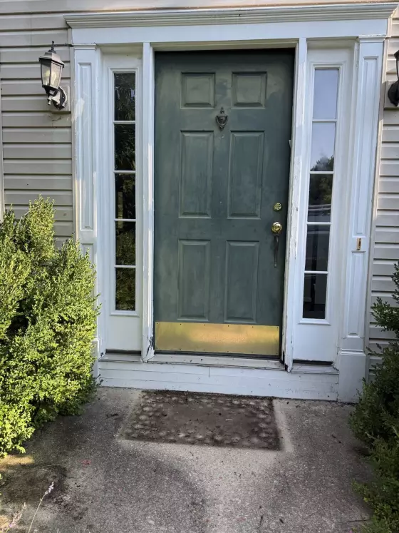 Existing exterior door before installation
