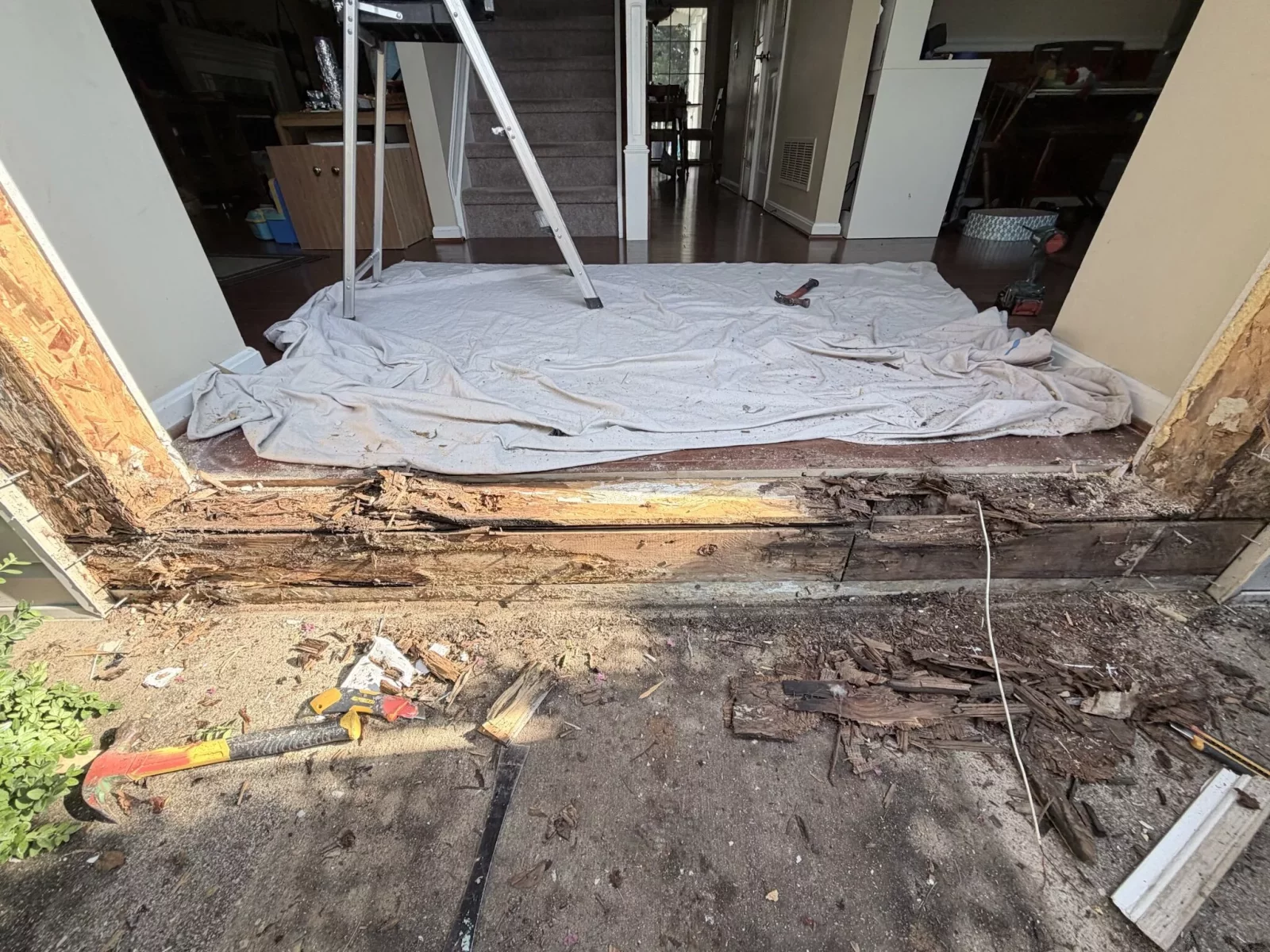 Rotted wood was discovered under the threshold