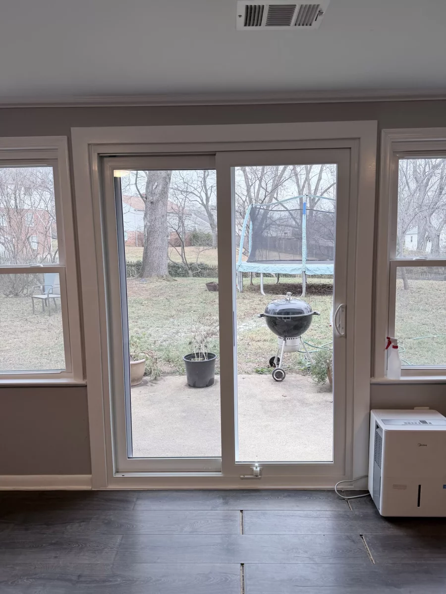 Sliding glass patio door installed in a residential interior room