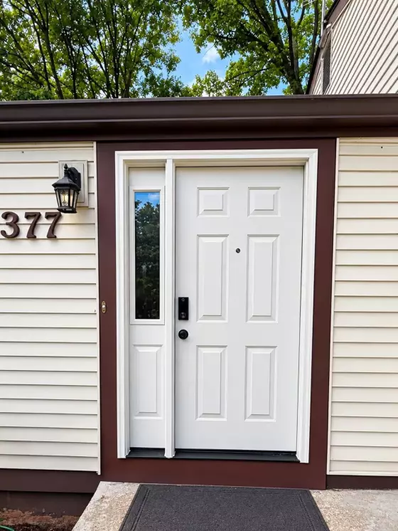 ProVia Ascent fiberglass front entry door with privacy glass sidelight professionally installed in Columbia, Maryland.