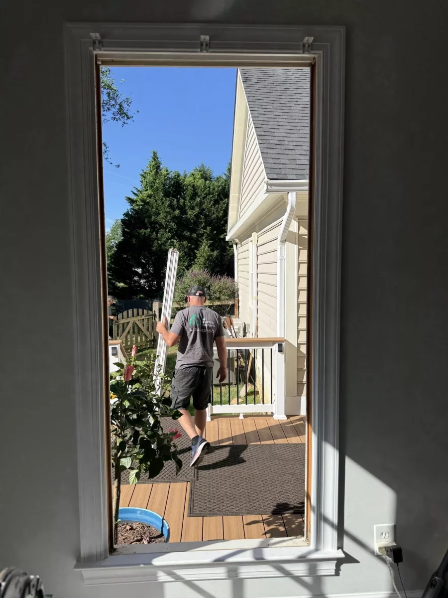 Window replacement in progress in Rockville, MD, showing the existing window removed and opening prepared for installation.