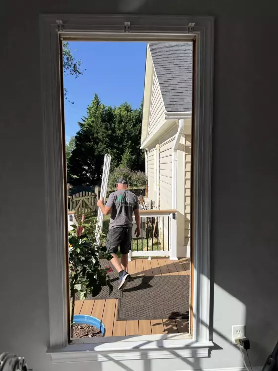 Window replacement in progress in Rockville, MD, showing the existing window removed and opening prepared for installation.