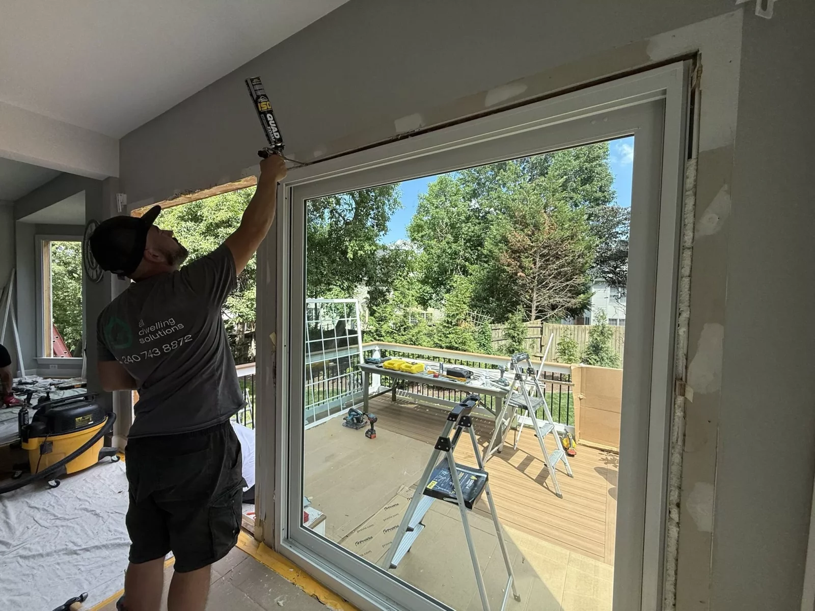 Full-frame patio door installation in Rockville, MD, with professional insulation, sealing, and interior finishing.