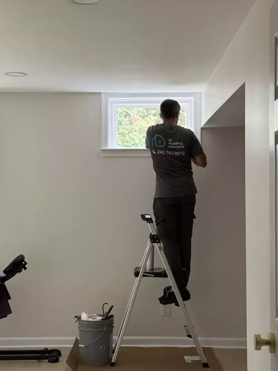 Professional basement window replacement and interior trim finishing in Rockville, MD by All Dwelling Solutions.