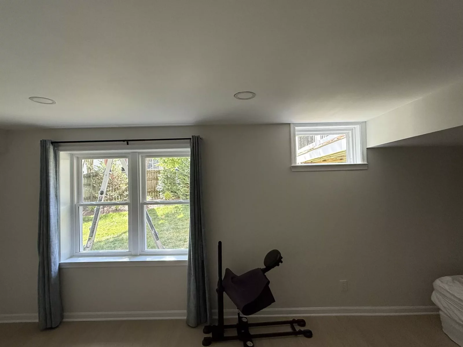 New double-hung windows and basement picture window professionally installed in Rockville, MD.
