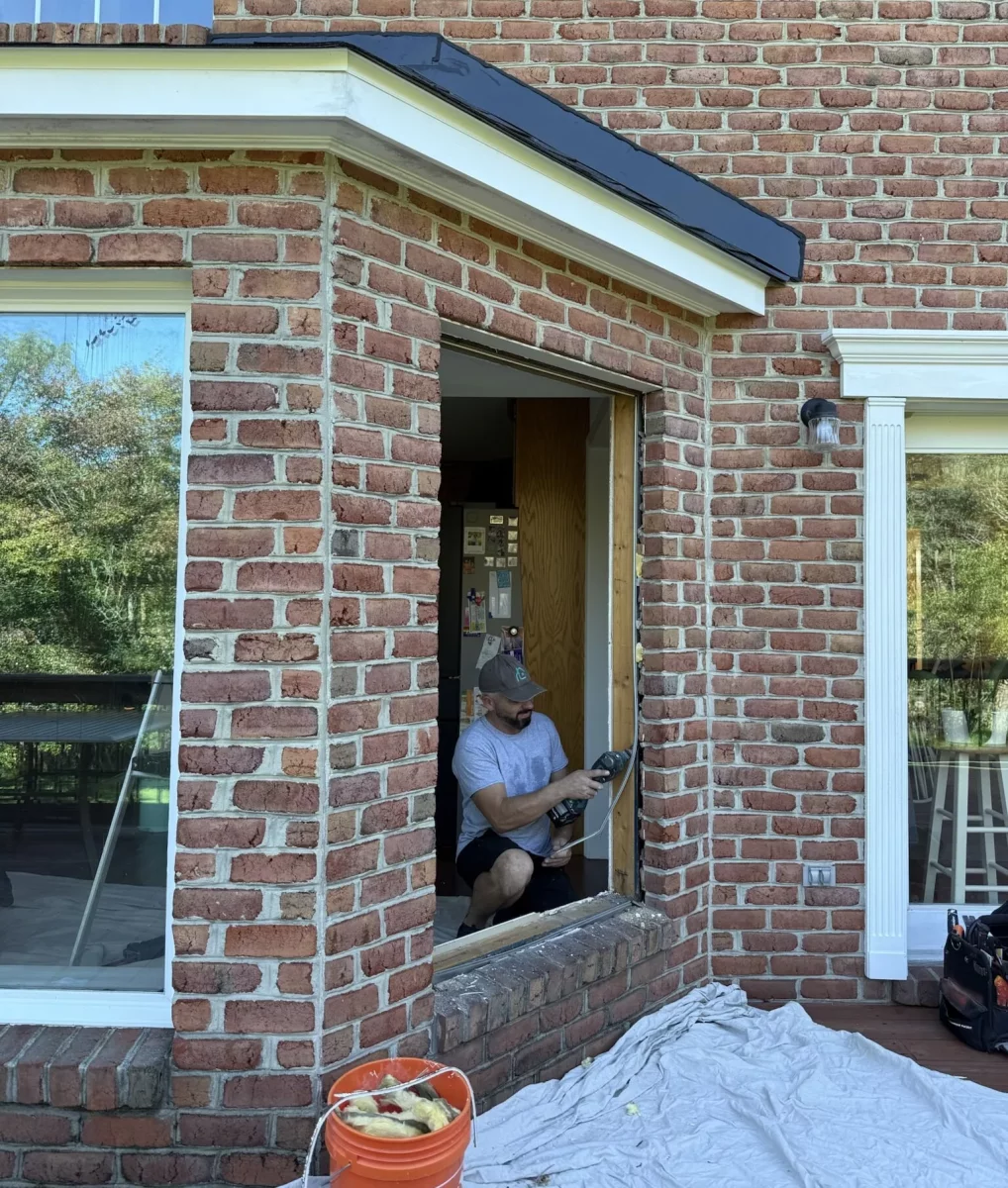 Full-frame window replacement in progress with old window frame removal for Oknoplast installation in Monrovia, Maryland