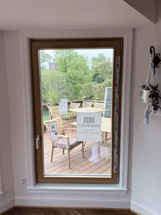 Finished Oknoplast tilt-and-turn window with custom interior trim after full-frame replacement in Monrovia, Maryland