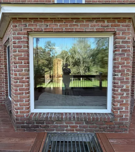 Large old picture window in white color
