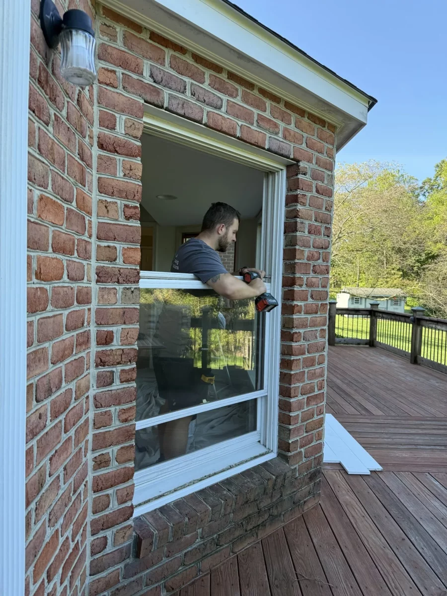 Oknoplast tilt-and-turn window installation in progress during full-frame window replacement in Monrovia, Maryland