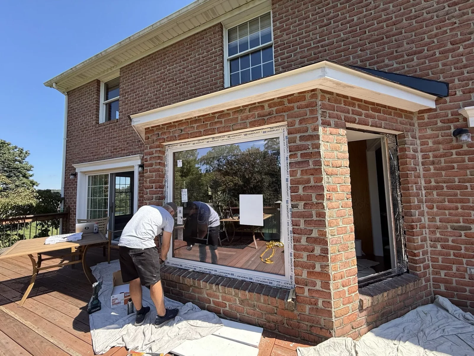 Professional full-frame Oknoplast tilt-and-turn window installation with protective flashing tape in Monrovia, Maryland