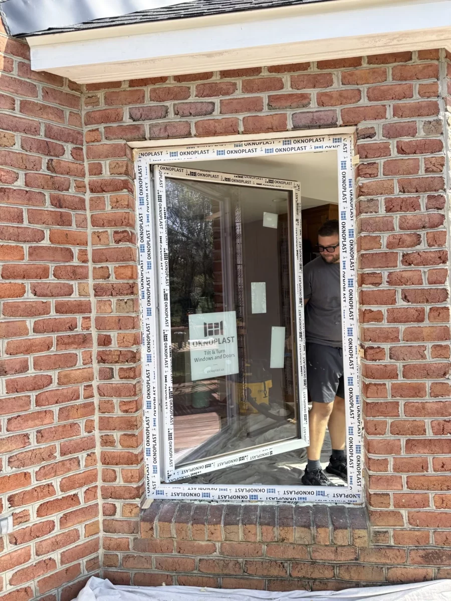 Tilt and turn window installation in brick exterior wall