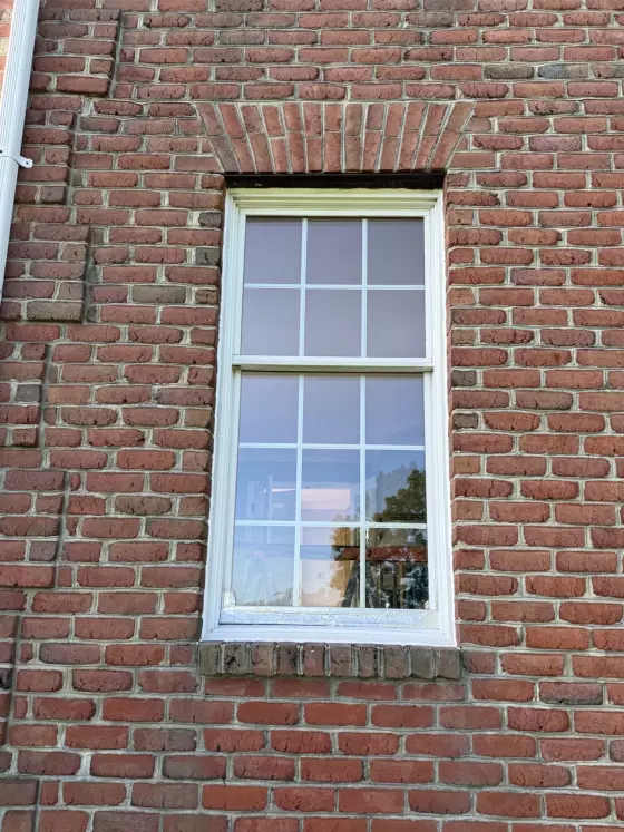 Old rotted Andersen window before full-frame replacement with a new Marvin Elevate window in Monrovia, Maryland