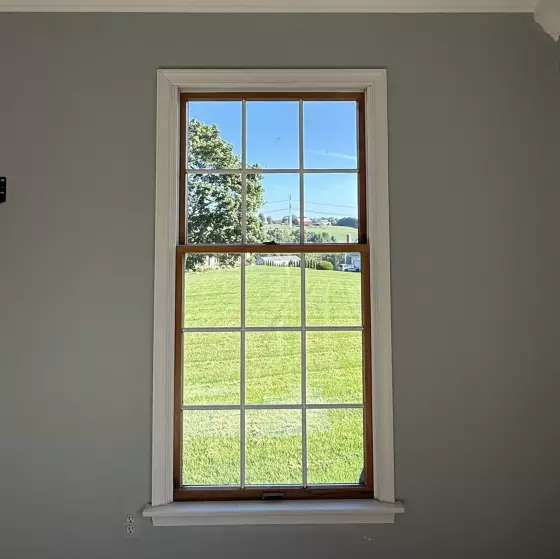 Old rotted Andersen window before full-frame replacement with a new Marvin Elevate window in Monrovia, Maryland.