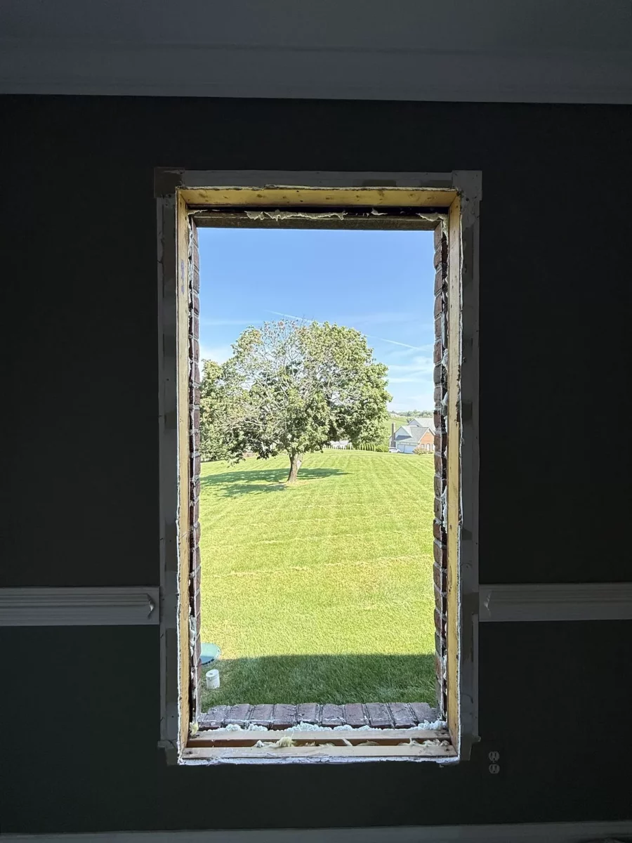 Interior wall with window opening prepared for installation