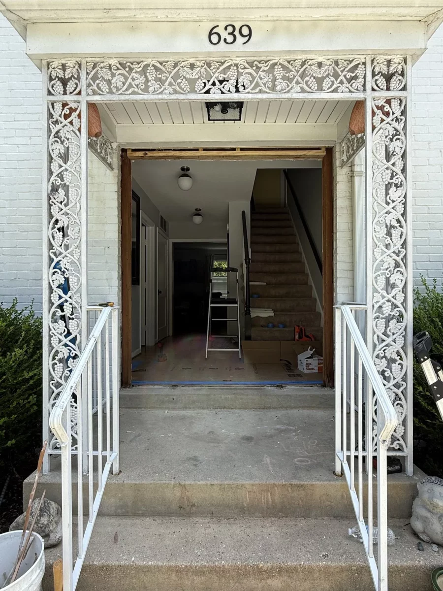 Clean rough opening after full removal of old entry door frame and sidelites, prepared for new ProVia door installation